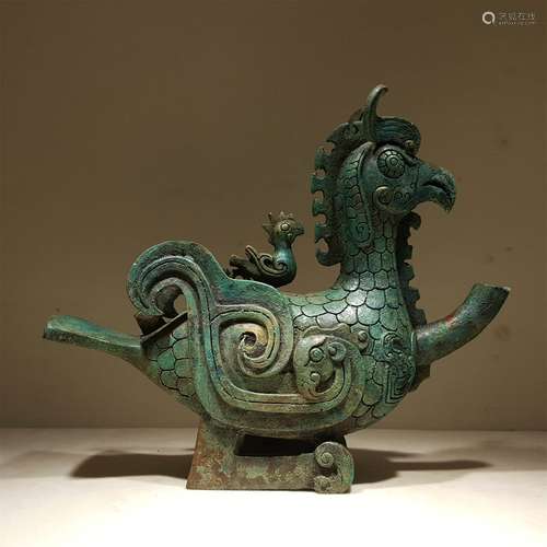 A WARRING STATES PERIOD BRONZE BIRD ZUN