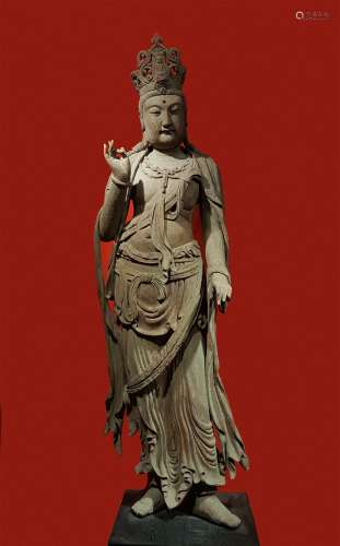 A TANG DYNASTY 
WOODCARVING GUANYIN STATUE