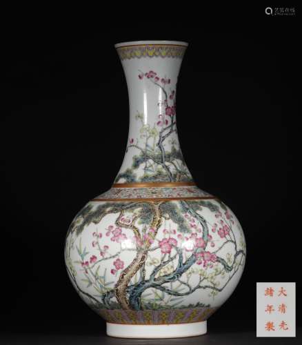 A QING DYNASTY FAMILLE ROSE BAMBOO AND PLUM FLOWER PATTERN PORCELAIN VASE