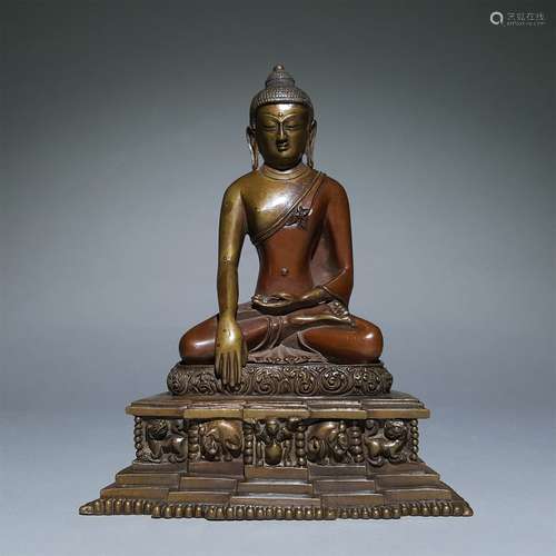 A YUAN DYNASTY DOUBLE COLOR BRONZE BUDDHA STATUE