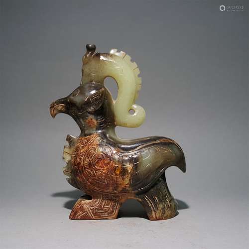 A WARRING STATES PERIOD CARVED JADE BIRD SHAPE ORNAMENT