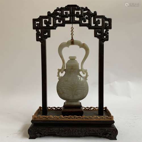 A QING DYNASTY CARVED WHITE JADE BOTTLE ORNAMENT