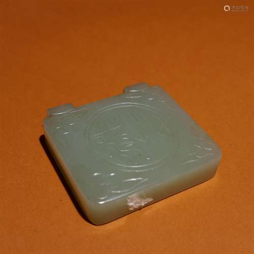 A MING DYNASTY CARVED WHITE JADE PENDANT