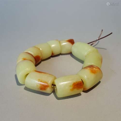 A RED MOUNTAIN CULTURE CARVED JADE PIG DRAGON SHAPE BRACELET