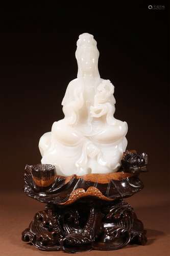 A CHINESE CARVED WHITE JADE RUYI GUANYIN ORNAMENT