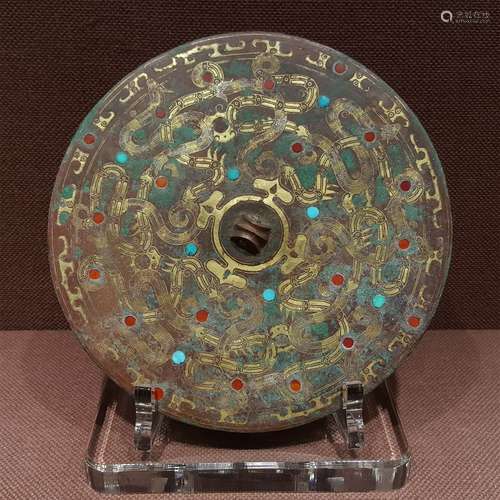 A WARRING STATES PERIOD BRONZE MIXED SILVER AND GOLD INLAID TURQUOIS MIRROR