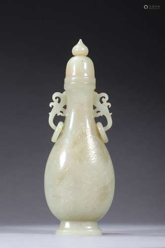 A QING DYNASTY CARVED HETIAN JADE FLOWER PATTERN VASE