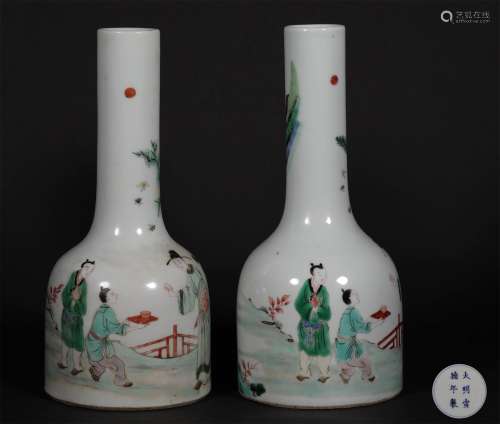 A PAIR OF QING DYNASTY 
MULTI COLORED PORCELAIN FIGURE PATTERN ZUN