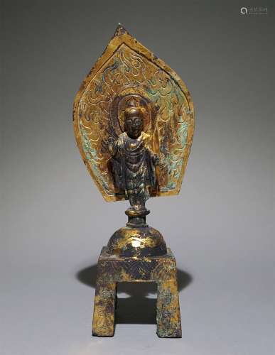 A NORTHERN WEI DYNASTY GILTING BRONZE SAKYAMUNI STATUE