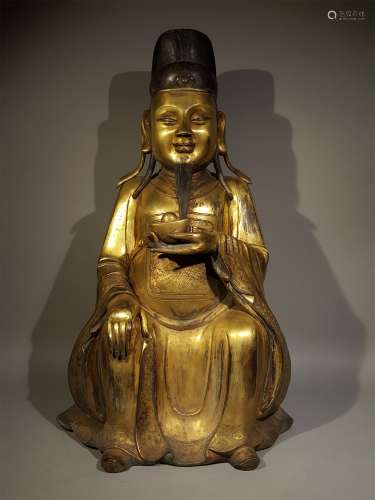A QING DYNASTY GILTING BRONZE GOD OF WEALTH STATUE