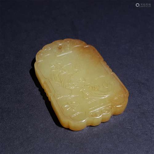 A QING DYNASTY CARVED WHITE JADE PENDANT