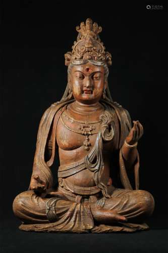 A LIAO DYNASTY PAINTED WOODEN BUDDHA STATUE