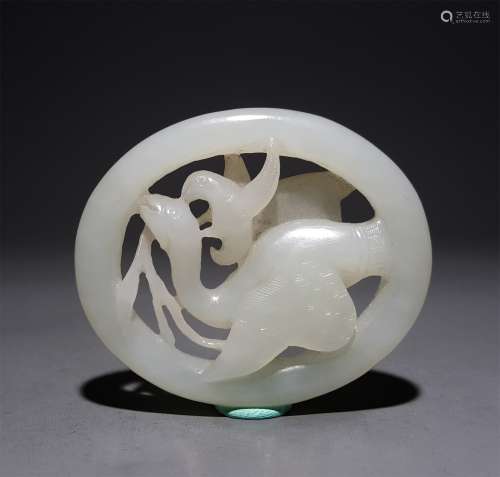 A CHINESE CARVED HETIAN JADE ORNAMENT, GYRFALCON