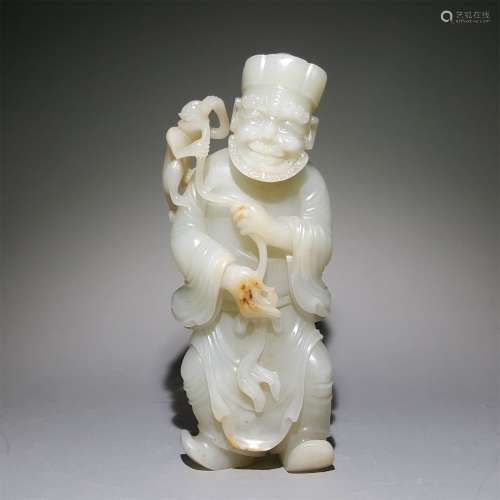 A QING DYNASTY CARVED WHITE JADE FIGURE ORNAMENT