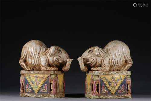 A PAIR OF CHINESE ELEPHANT SHAPE PORCELAIN ORNAMENTS