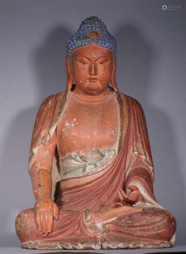 A TANG DYNASTY PAINTED WOODEN BUDDHA STATUE