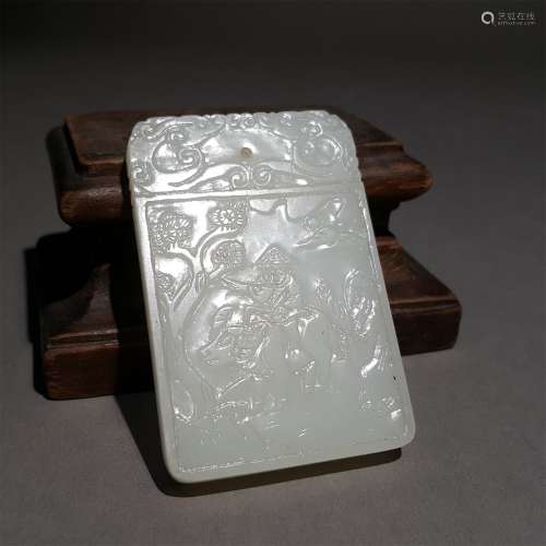 A QING DYNASTY CARVED WHITE JADE PENDANT