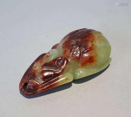 A RED MOUNTAIN CULTURE CARVED JADE BEAST ORNAMENT