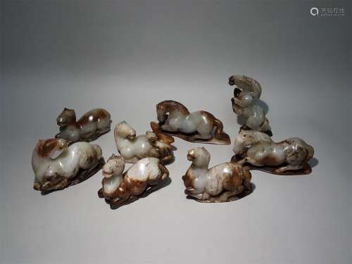 A SET OF TANG DYNASTY CARVED JADE HORSE ORNAMENTS