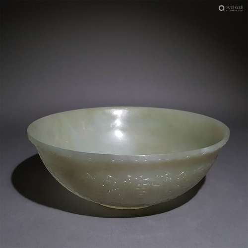 A QING DYNASTY CARVED WHITE JADE BOWL