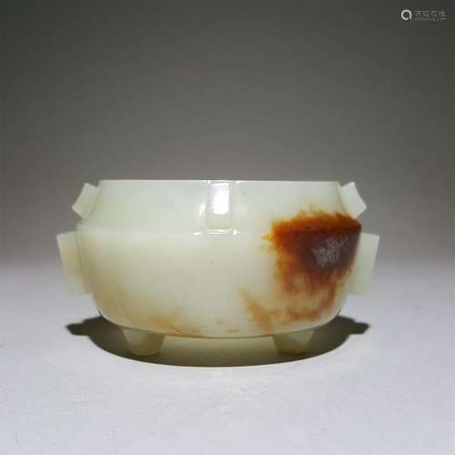 A QING DYNASTY CARVED WHITE JADE BOWL