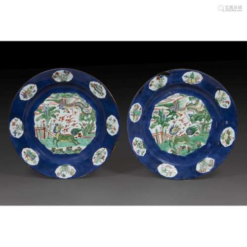 PAIR OF LARGE ROUND PLATES in porcelain and polych…