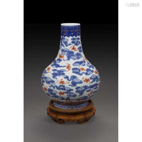 LONG NECK PANSU VASE in porcelain, blue underglaze…