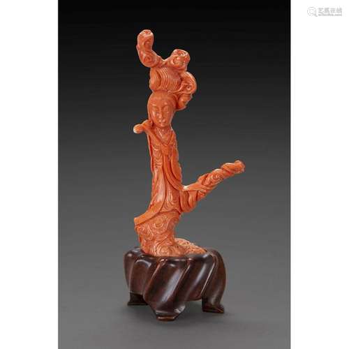 ~STATUETTE in orange red coral, representing a god…