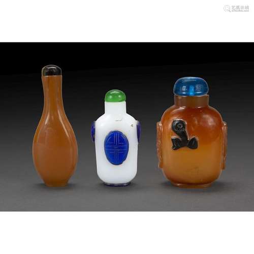 CONTINUOUS THREE TABATED GLASS BOTTLES, two in imi…