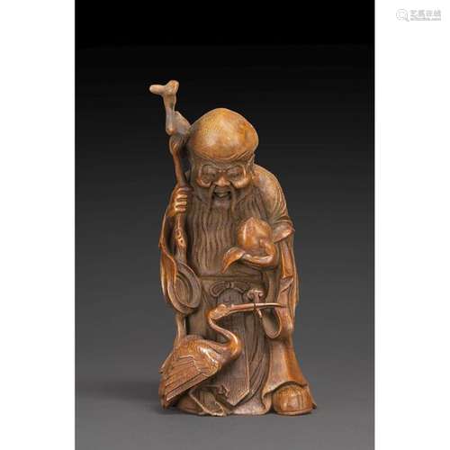 STATUETTE in bamboo root, representing Shou Lao ho…