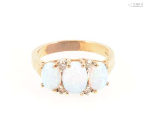 An opal three stone ring.