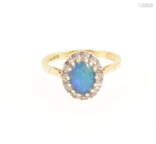 An opal triplet oval cluster ring.