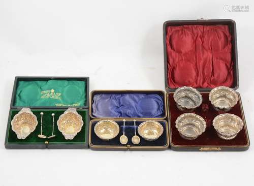 Three sets of cased silver salts.