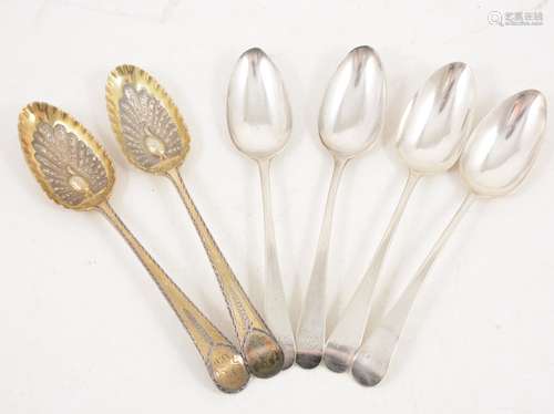 A pair of silver gilt spoons and two other pair of spoons,