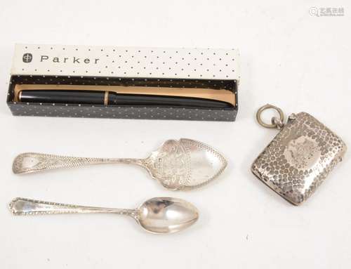 A silver vesta case, two silver spoons and a Parker pen.