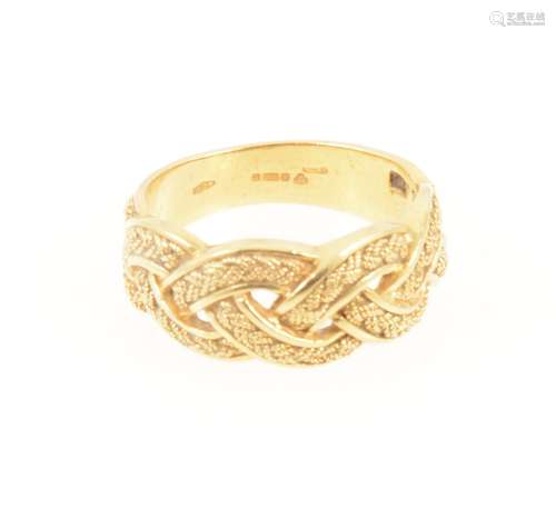 An 18 carat yellow gold plaited friendship ring.