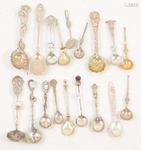 Eighteen decorative and novelty silver salt spoons.