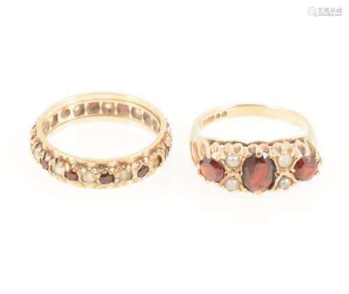 A garnet and pearl ring and a garnet eternity ring.