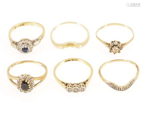 Five gemset rings and a shaped wedding band.