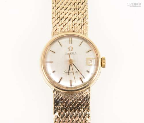 Omega - a lady's 9 carat yellow gold Ladymatic wrist watch.