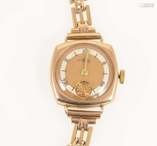 Avia - a lady's 9 carat yellow gold bracelet watch.