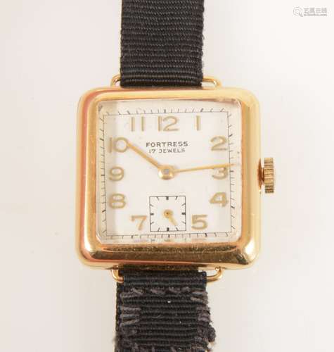 Fortress - a lady's yellow metal wrist watch.