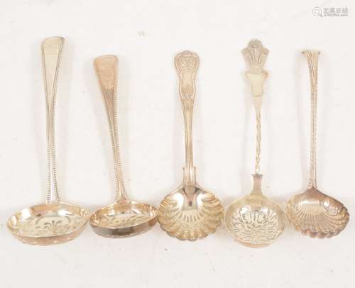 Five silver sugar sifting spoons, London.