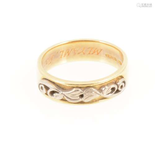 An 18 carat yellow and white gold friendship ring.