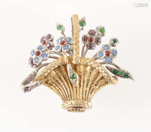 A flower basket brooch set with coloured stones.