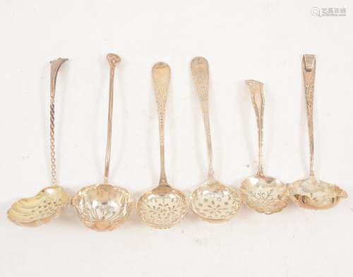 Six small silver sugar sifting spoons.