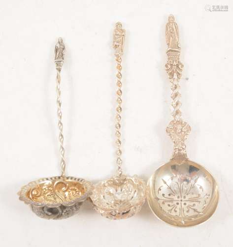 Three silver sugar sifting spoons with Apostle finials.