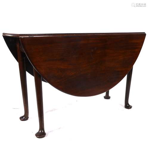 A 19th century mahogany drop-leaf dining table