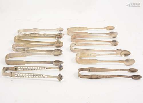 Ten pairs of silver sugar tongs,