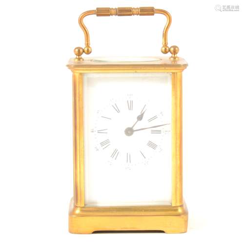 A French brass carriage clock, stamped Brevete HA